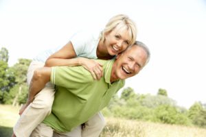 Mature couple having fun in countryside